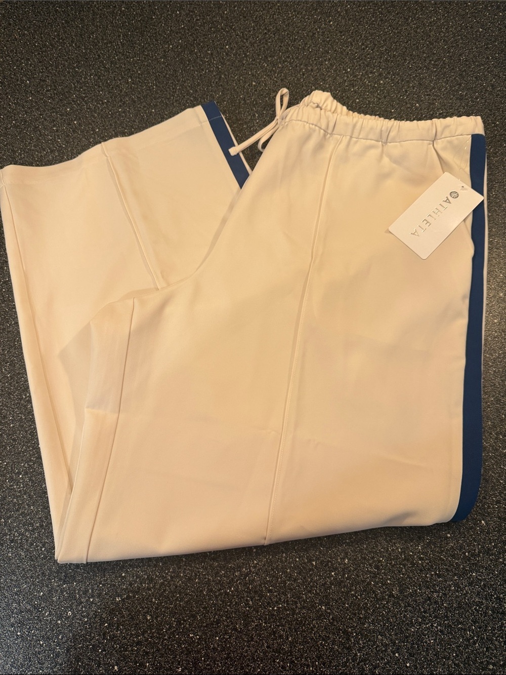 NWT Woman’s Athleta Cream Track Pants with Navy Side Stripe - size 1X